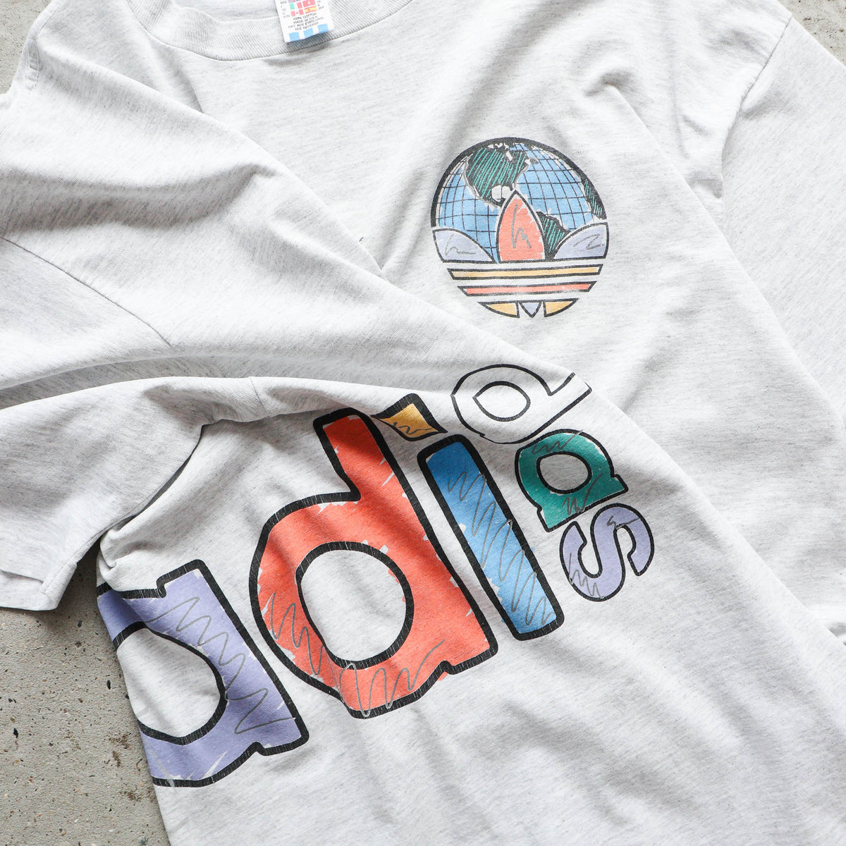 Adidas Soccer Wraparound Graphic Tee – 90s (XL)