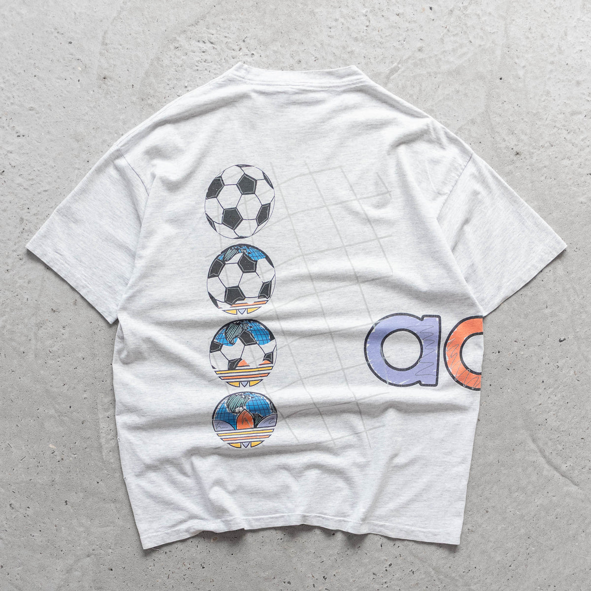 Adidas Soccer Wraparound Graphic Tee – 90s (XL)