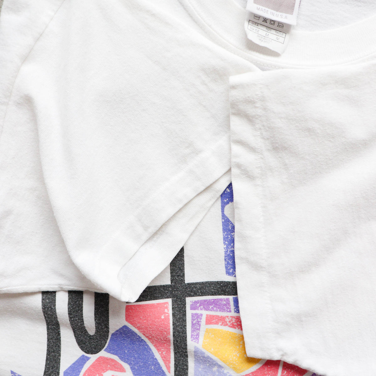 Nike Abstract Wraparound Graphic Tee – 90s (M)