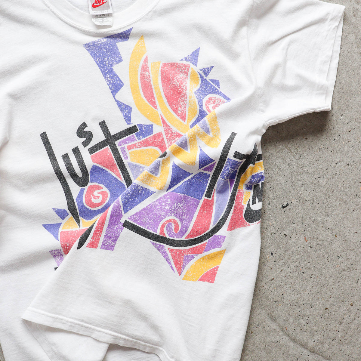 Nike Abstract Wraparound Graphic Tee – 90s (M)