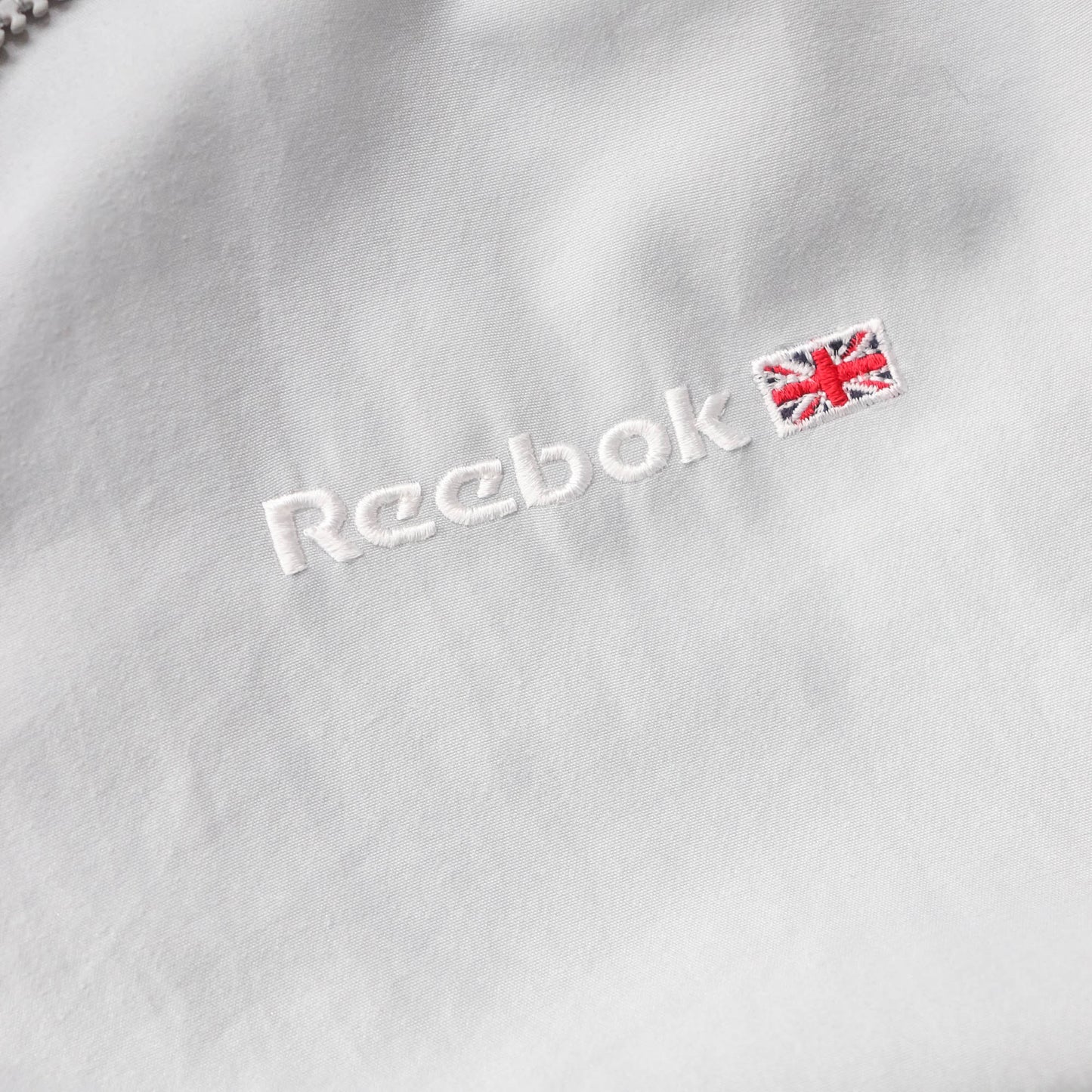 Reebok Embroidered Spellout Windbreaker Jacket - 90s (M)