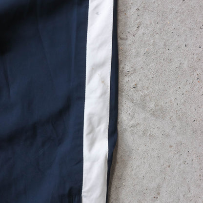 Nike Mini Swoosh Striped Track Pants - 2000s XL)